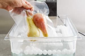 Sous vide cooking of pears in a sous vide precision immersion cooker with water and water balls