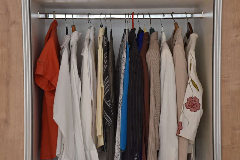 Interior of the closet with women's wardrobe