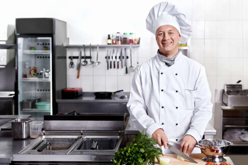 Cook cut vegetables in the kitchen