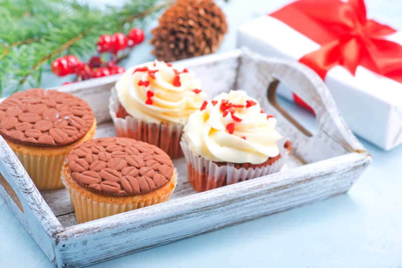 Muffins and Christmas decoration on a table