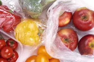 Plastic bags of fruits and vegetables
