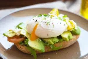 Sandwich with avocado and poached egg