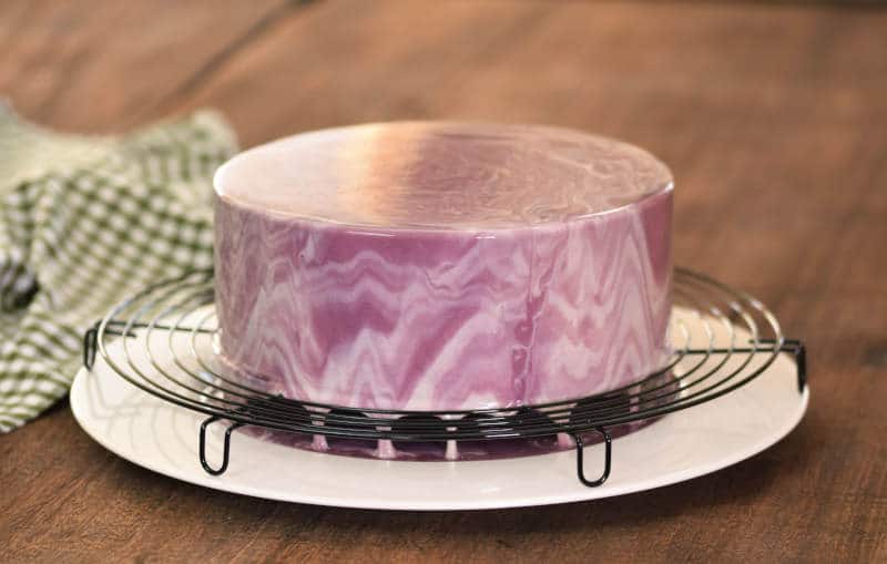 French Mousse Cake Covered With Purple Glaze