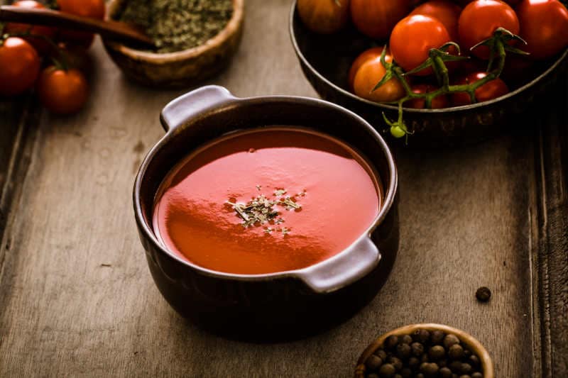 Homemade tomato soup with tomatoes, herbs and spices.