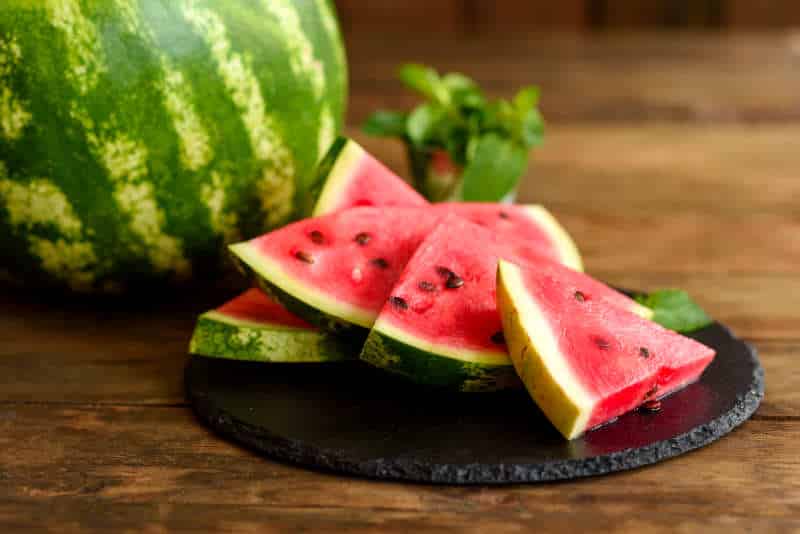 Fresh delicious watermelon sliced with mint and watermelon juice