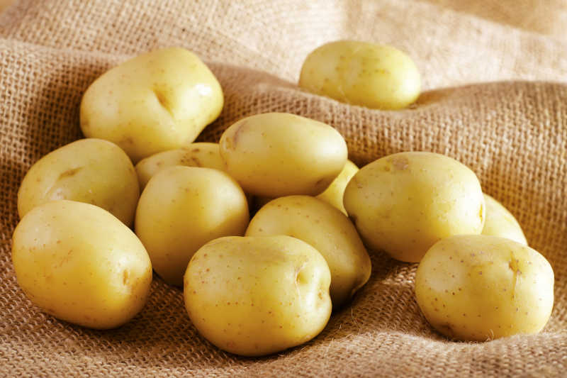Fresh potatoes on a bag