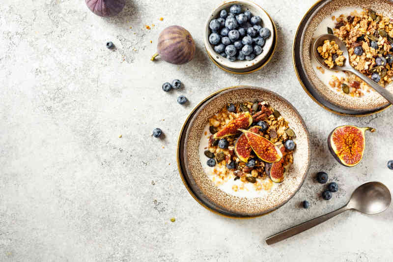 Homemade granola with yogurt and blueberry. Healthy Breakfast.