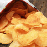Potato chips in a vacuum sealed bag opened earlier