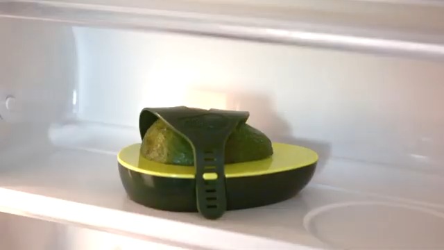 Avocado halves put in a avocado saver