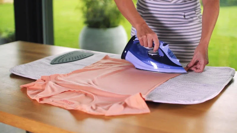 Using ironing blanket to iron clothes