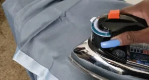 Ironing curtain to remove wrinkles