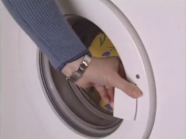 Throwing the cover into the washer